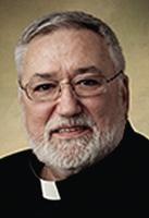 City honors priest for offering church as concert venue