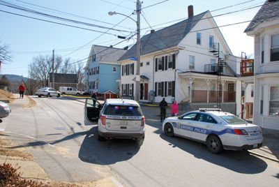 Woman charged in stabbing