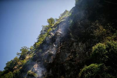 Honey hunters in Nepal scale incredible heights to harvest the honey of the Himalayan cliff bee.