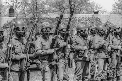 Ohio National Guardsmen on the Kent State University campus prepare to disperse student protesters on May 4, 1970. Troops later opened fire on students, killing four.