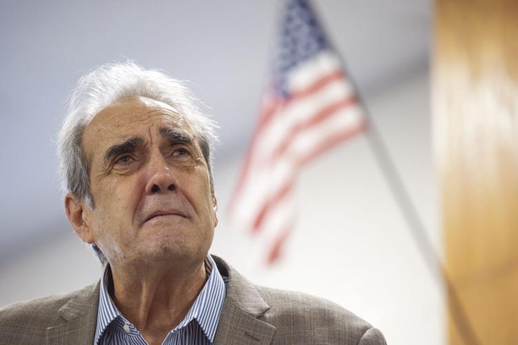 Bill Athanas with flag