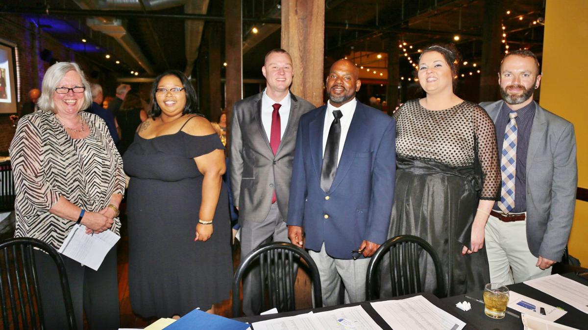 Anita Hellstrom, Danielle Douthit (Direct Service Liaison), Eric Schultz (Coordinator), Doug Evans (Coordinator) Christine Syberg (Office Manager), Aaron M. Laxton (Director of Client Services)