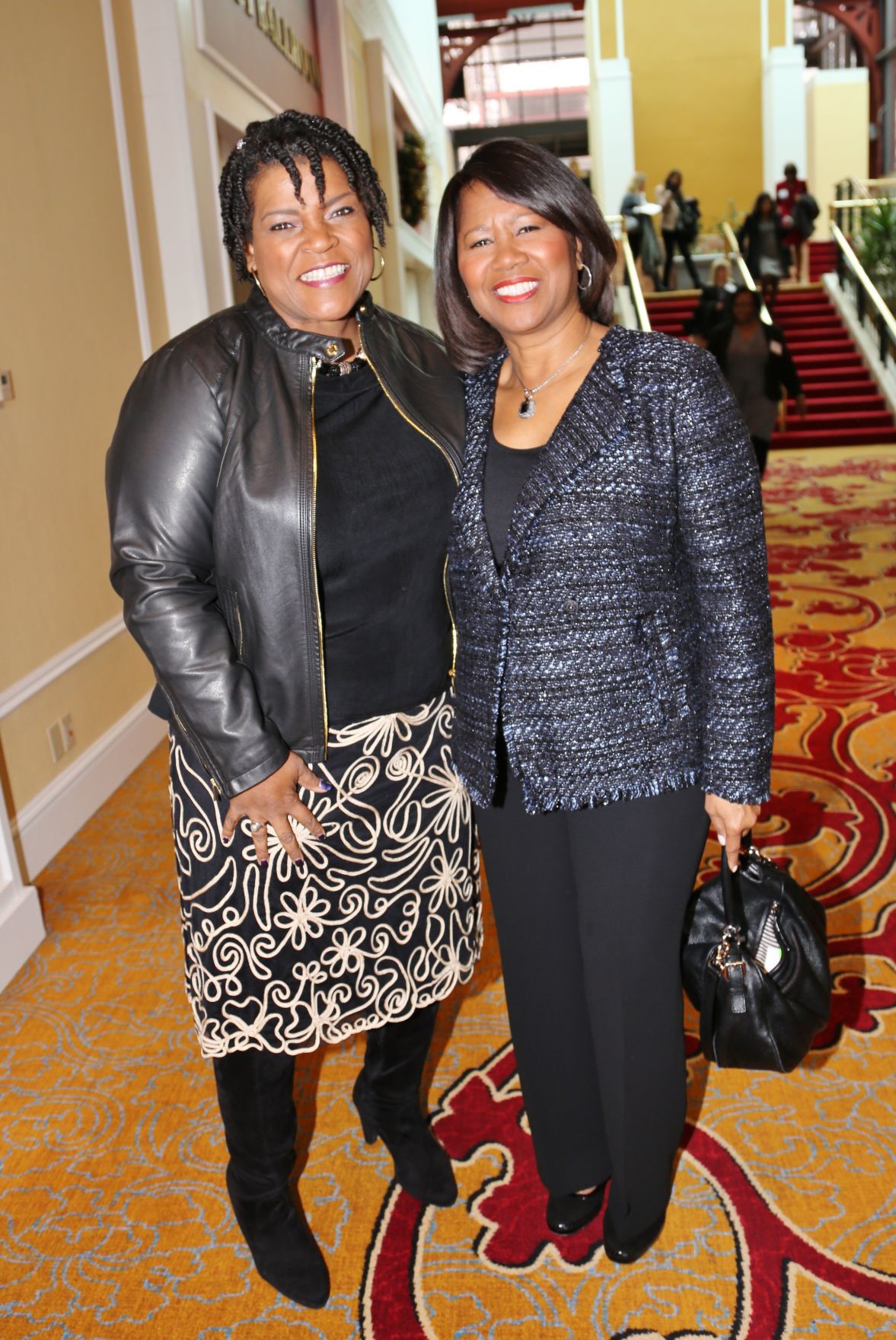 Emcee Carol Daniel, CEO Adrian Bracy