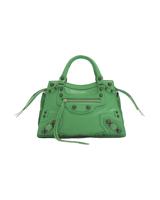 Go green — this year’s color of spring – with these top 10 trending fashion must-haves