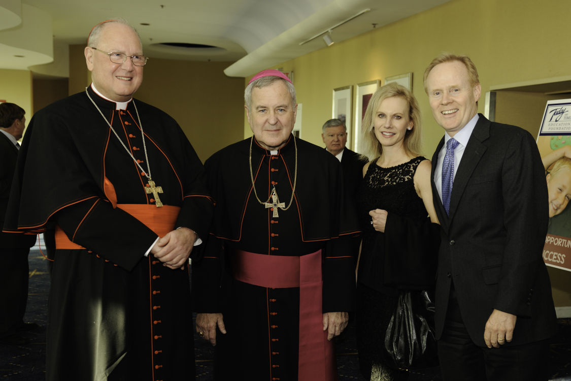Cardinal Timothy Dolan, Archbishop Robert Carlson, Ann and Bill Corrigan