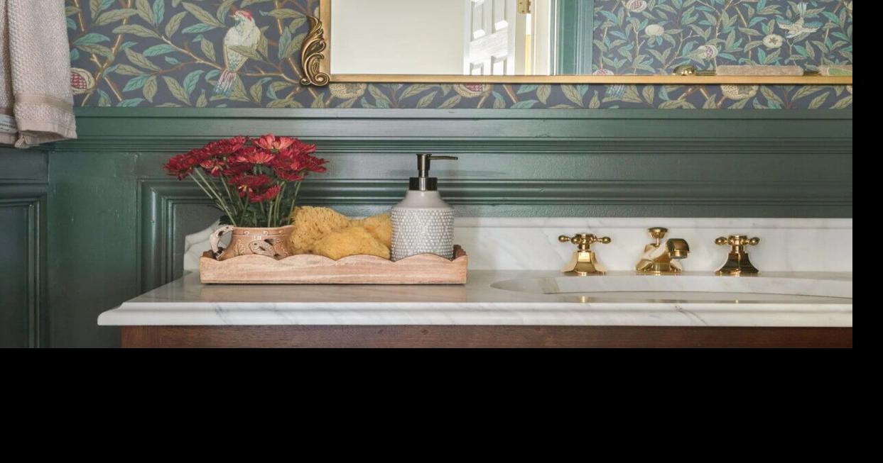Thoughtful details transform a traditional hall bath into a charming space