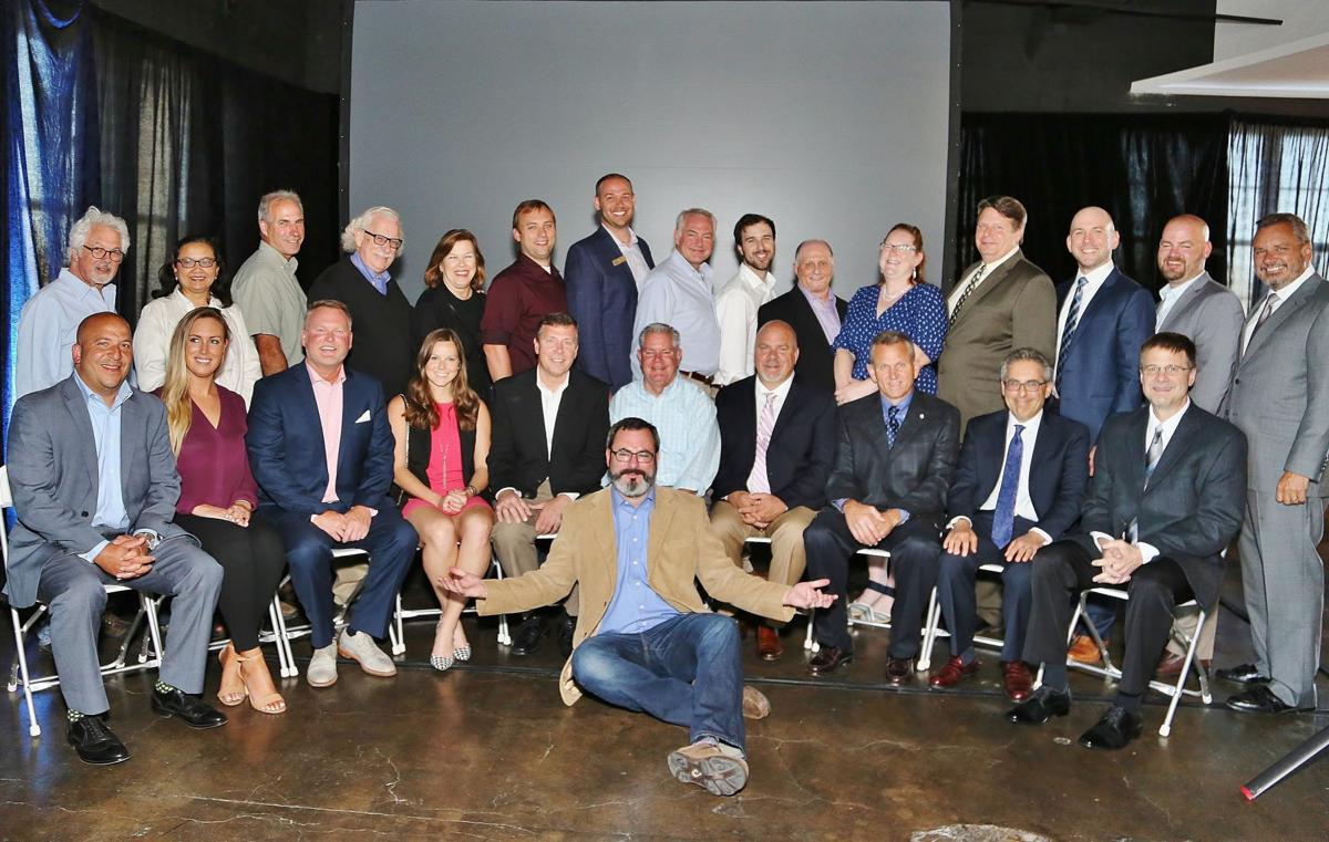 Front: Matt Lanzone, Lauren Ruzicka, Jim Treis, Alyssa Houska, Chris West, Shawn Luesse, Frank Jacobs, David Roth, Jim Singer, John Kahrhoff
Back: Tom Cohen, San San Smith, Lee Lindsey, Timothy and Marcia Dorsey, Nathan Zierer, Chris Caskey, Doug Herty,