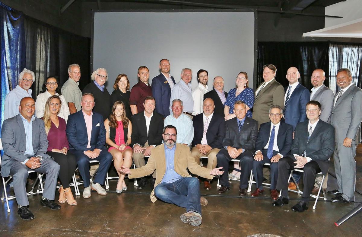 Front: Matt Lanzone, Lauren Ruzicka, Jim Treis, Alyssa Houska, Chris West, Shawn Luesse, Frank Jacobs, David Roth, Jim Singer, John Kahrhoff
Back: Tom Cohen, San San Smith, Lee Lindsey, Timothy and Marcia Dorsey, Nathan Zierer, Chris Caskey, Doug Herty,