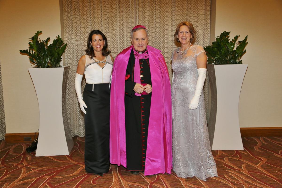 Chairperson Julie George, Archbishop Robert Carlson, President Doey Boldt