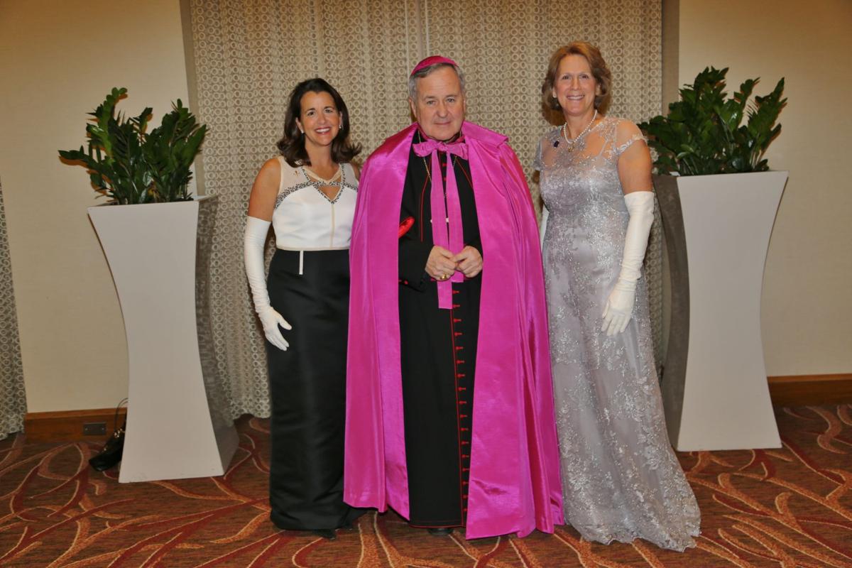 Julie George, Chairperson, Archbishop Robert Carlson, Doey Boldt, President