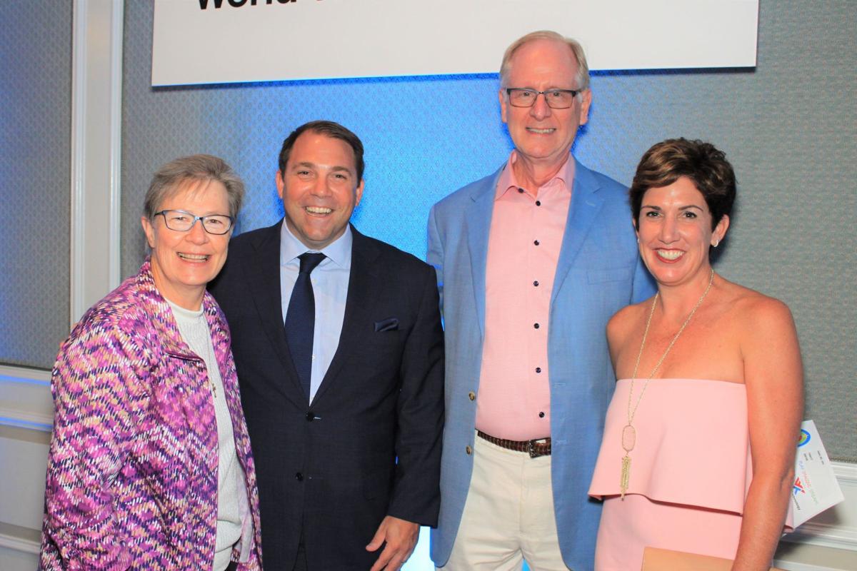 Sr. Claudia Ward, Steve Mackin, John Hubert (Pres. Mercy Clinic), Kelly Mackin