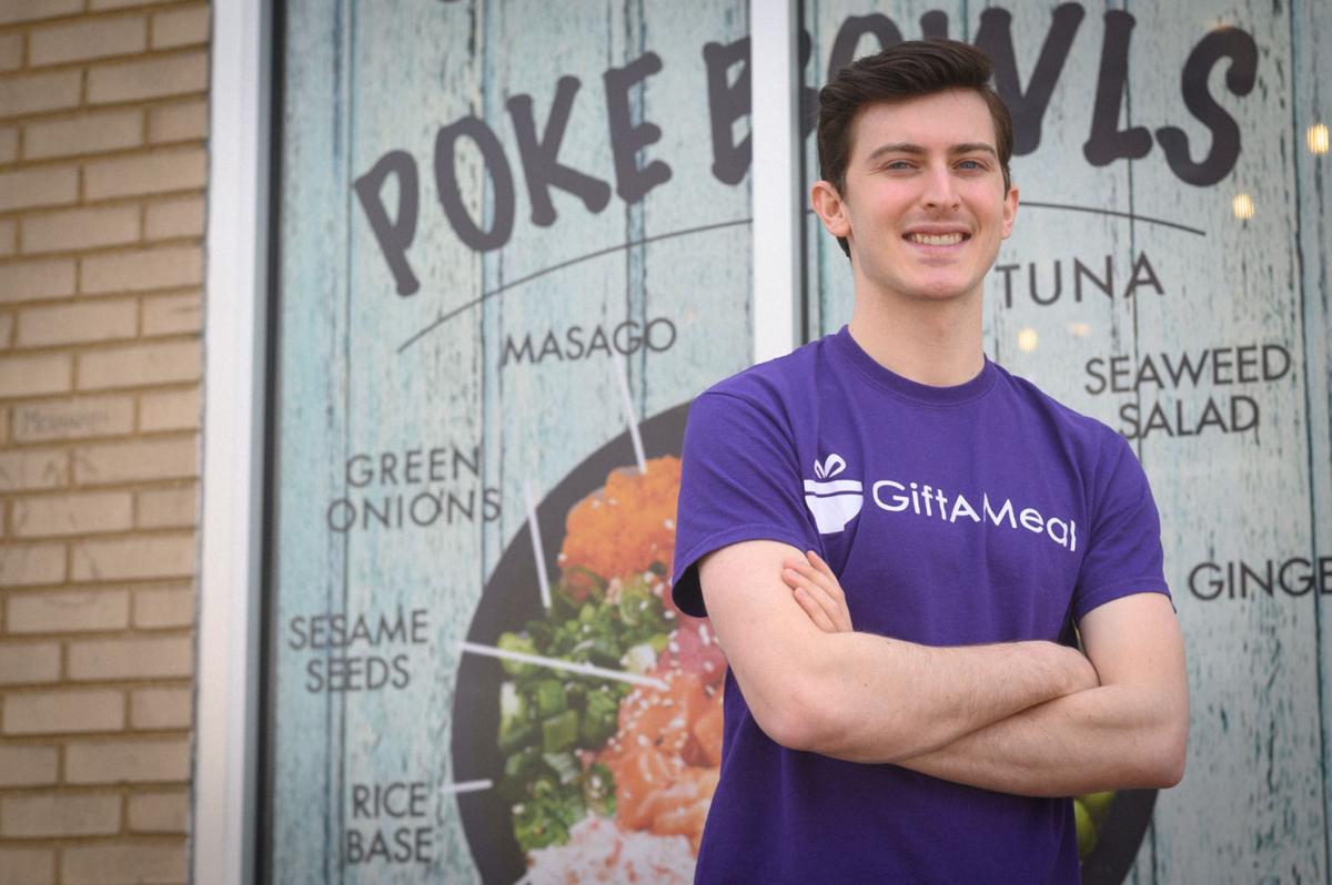 Andrew in front of poke doke - credit Michael Thomas.jpg