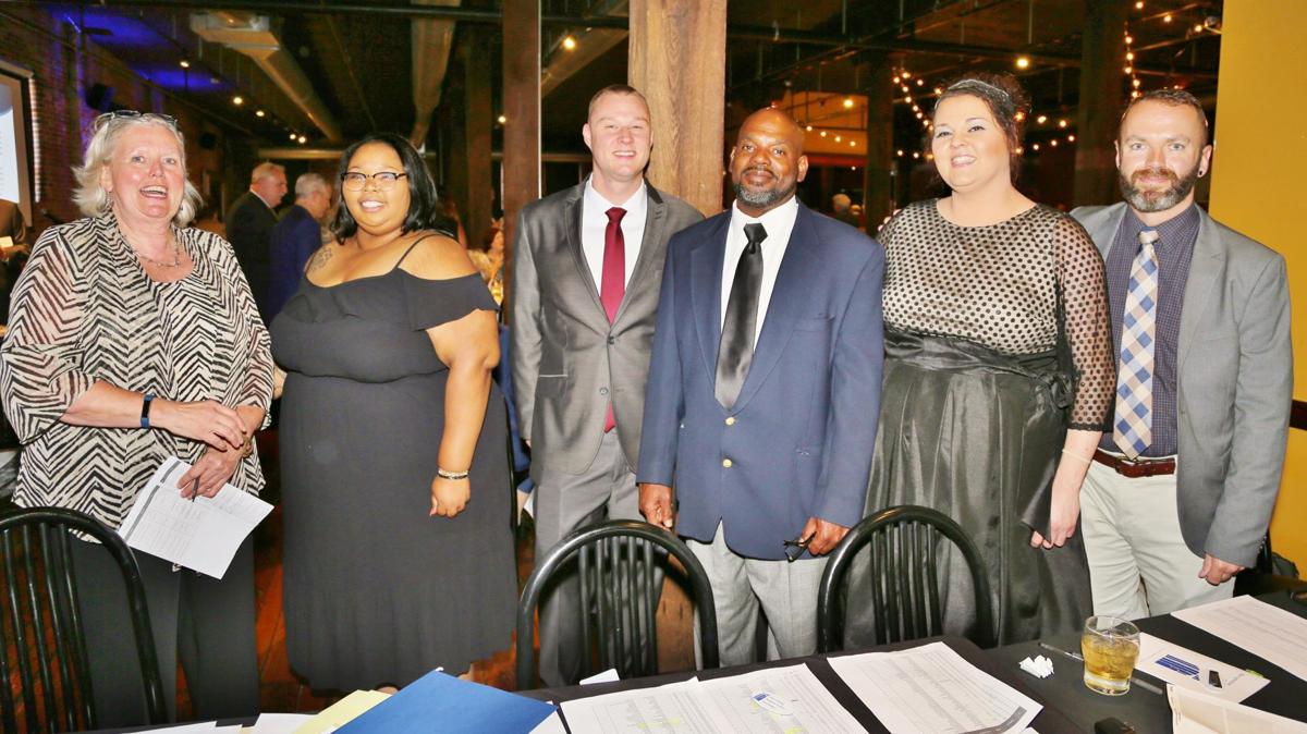 Anita Hellstrom, Danielle Douthit (Direct Service Liaison), Eric Schultz (Coordinator), Doug Evans (Coordinator) Christine Syberg (Office Manager), Aaron M. Laxton (Director of Client Services)