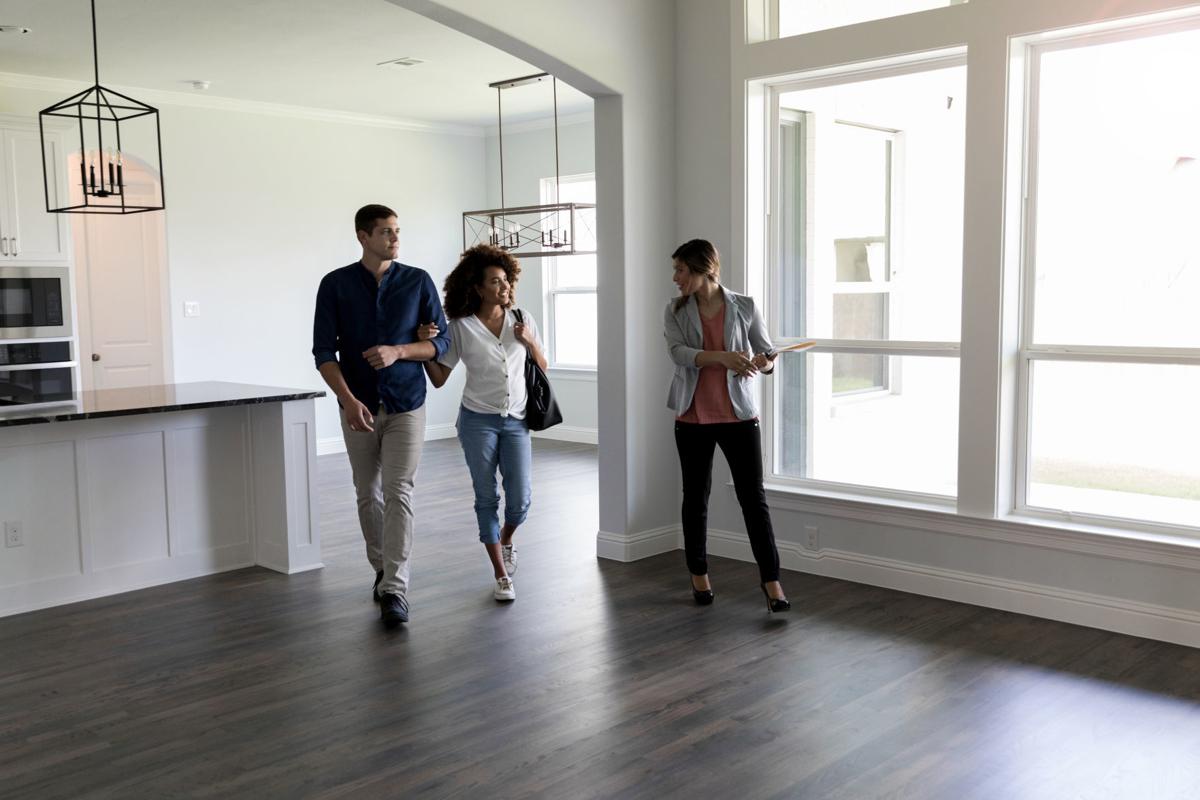 Couple meets with realtor