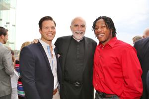 Michael Harris, Father Ralph Siefert, Ja Marion Johnson, speaker