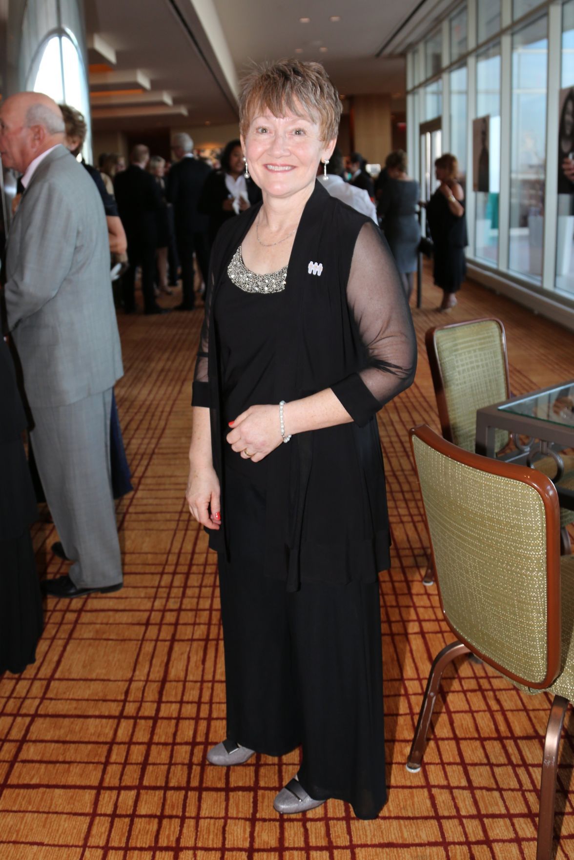 Claire Wyneken, President and CEO
