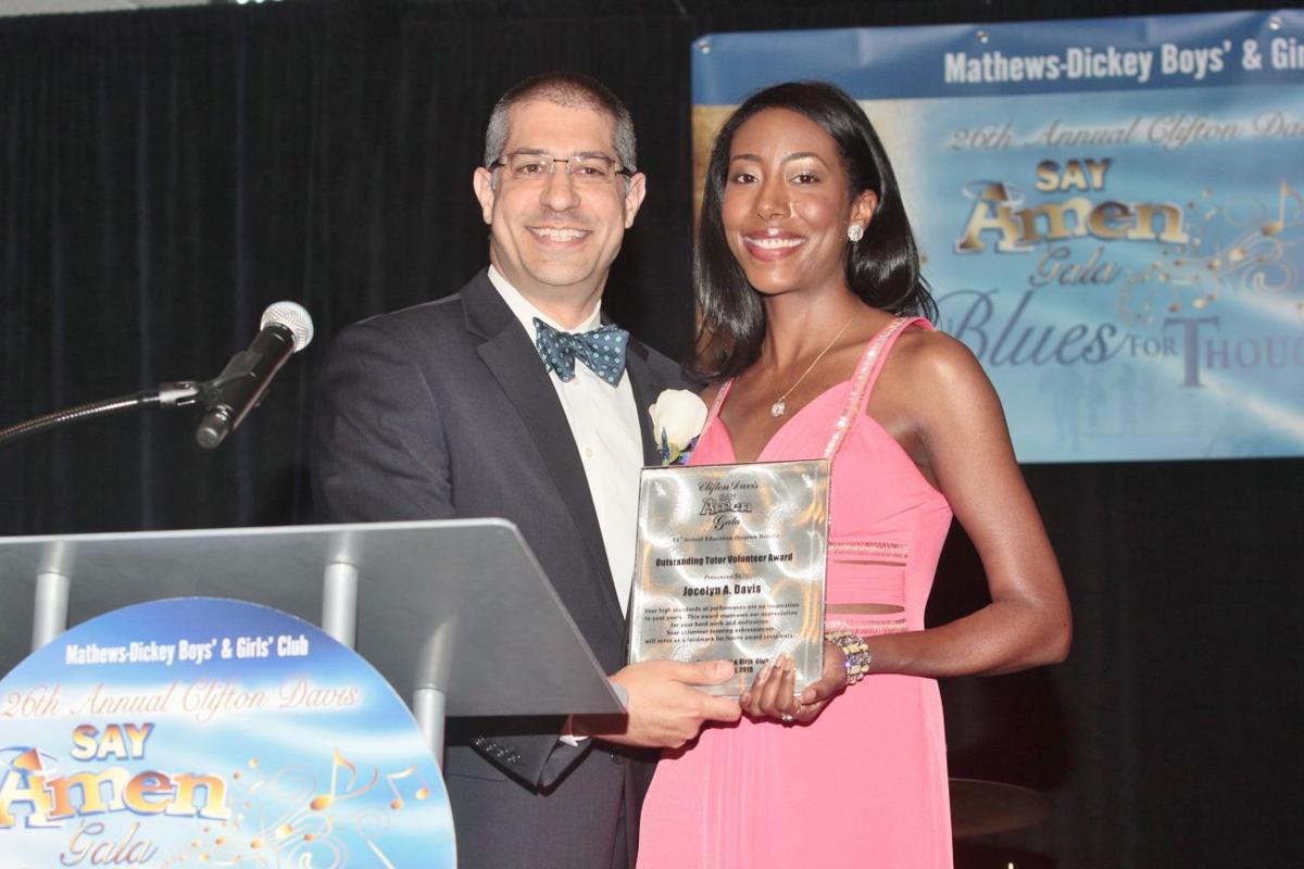 Event chairman Ernst & Young Executive Director Mike Weiss, Outstanding Tutor Volunteer honor to Mathews-Dickey alumnae and BJC nurse Jocelyn Davis.