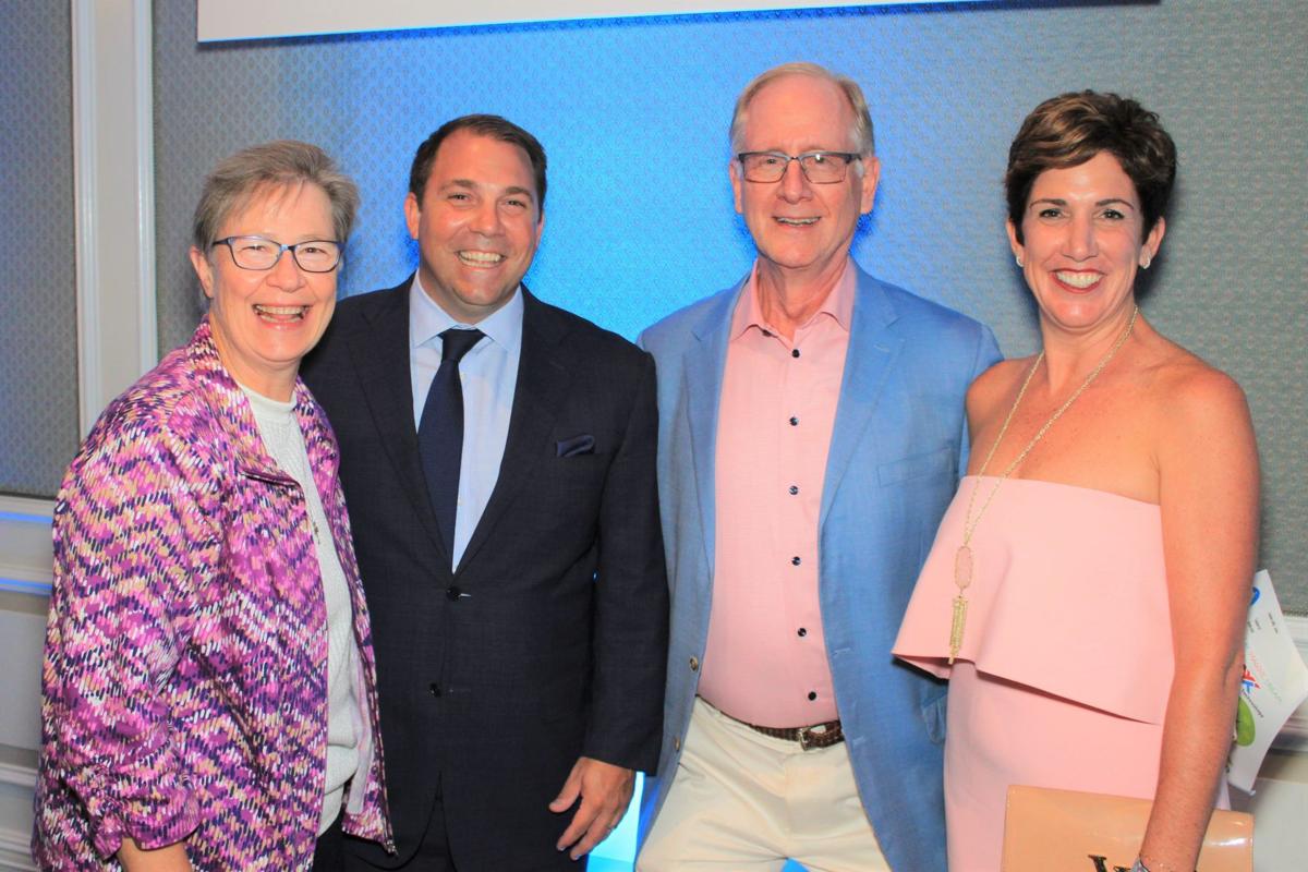 Sr. Claudia Ward, Steve Mackin, John Hubert (Pres. Mercy Clinic), Kelly Mackin