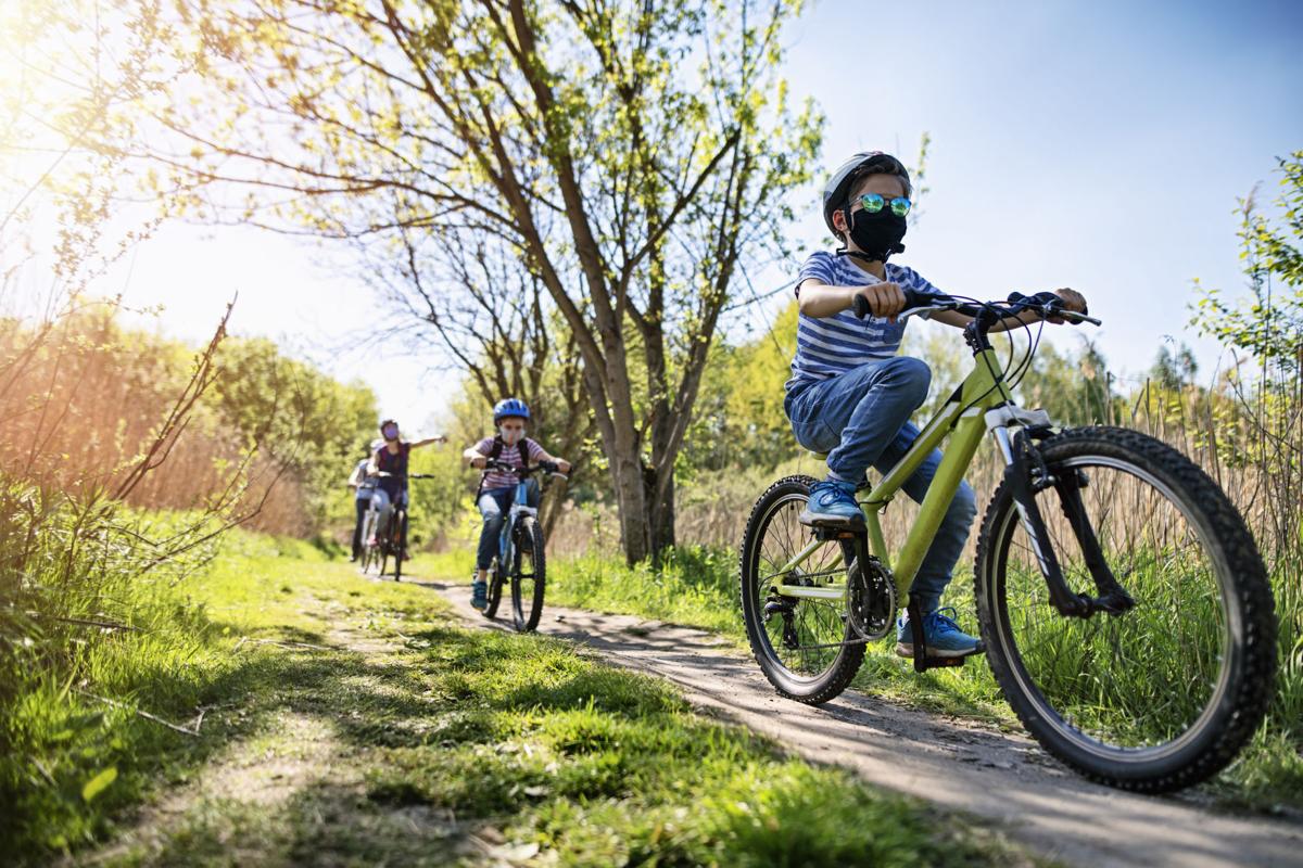 Family enjoying a bike trip during COVID-19 pandemic
