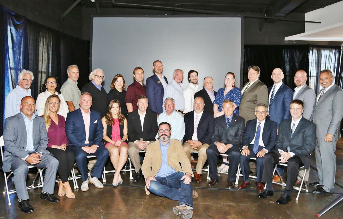 Front: Matt Lanzone, Lauren Ruzicka, Jim Treis, Alyssa Houska, Chris West, Shawn Luesse, Frank Jacobs, David Roth, Jim Singer, John Kahrhoff
Back: Tom Cohen, San San Smith, Lee Lindsey, Timothy and Marcia Dorsey, Nathan Zierer, Chris Caskey, Doug Herty,