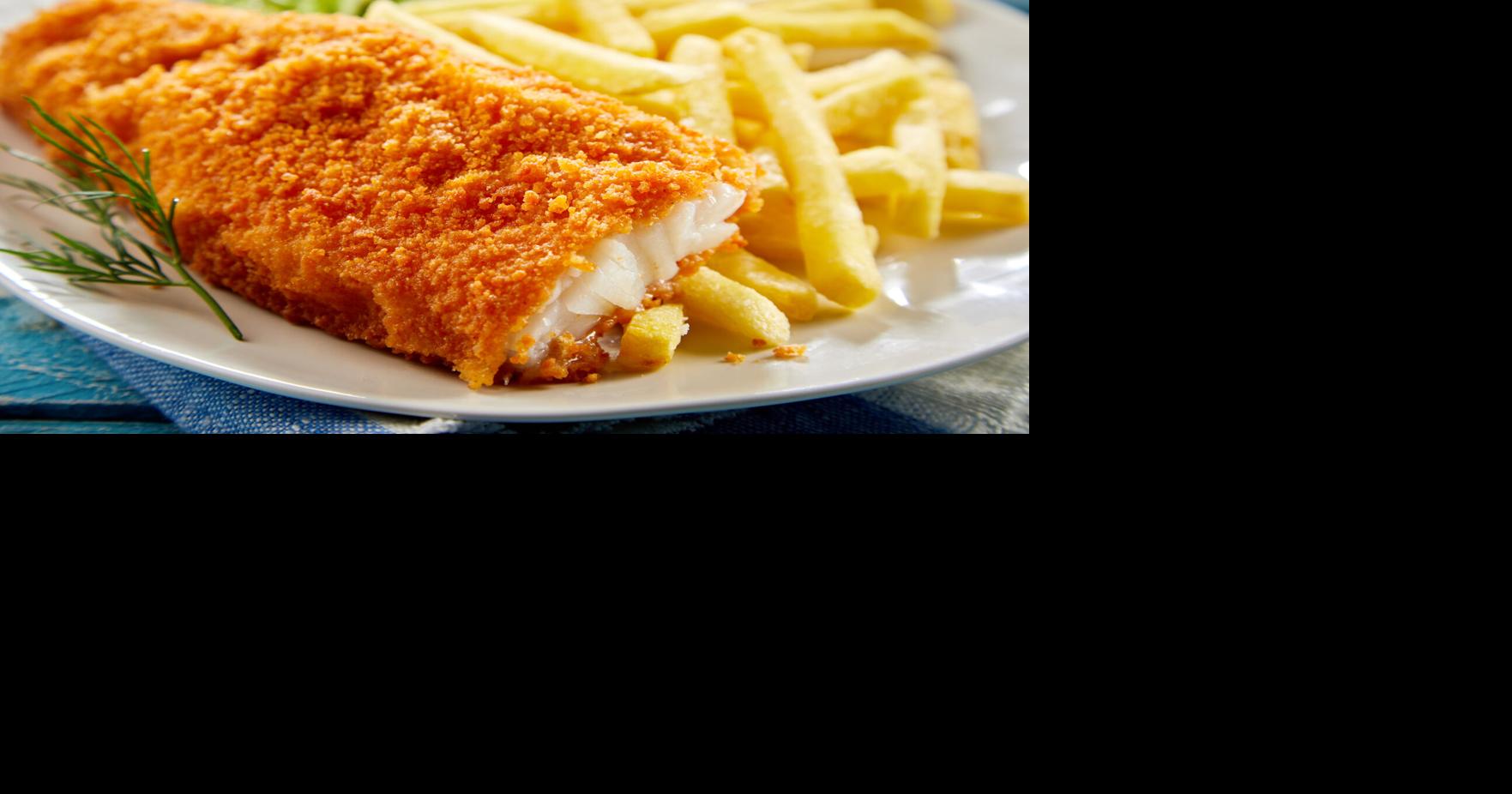Portion of crispy fish with french fries