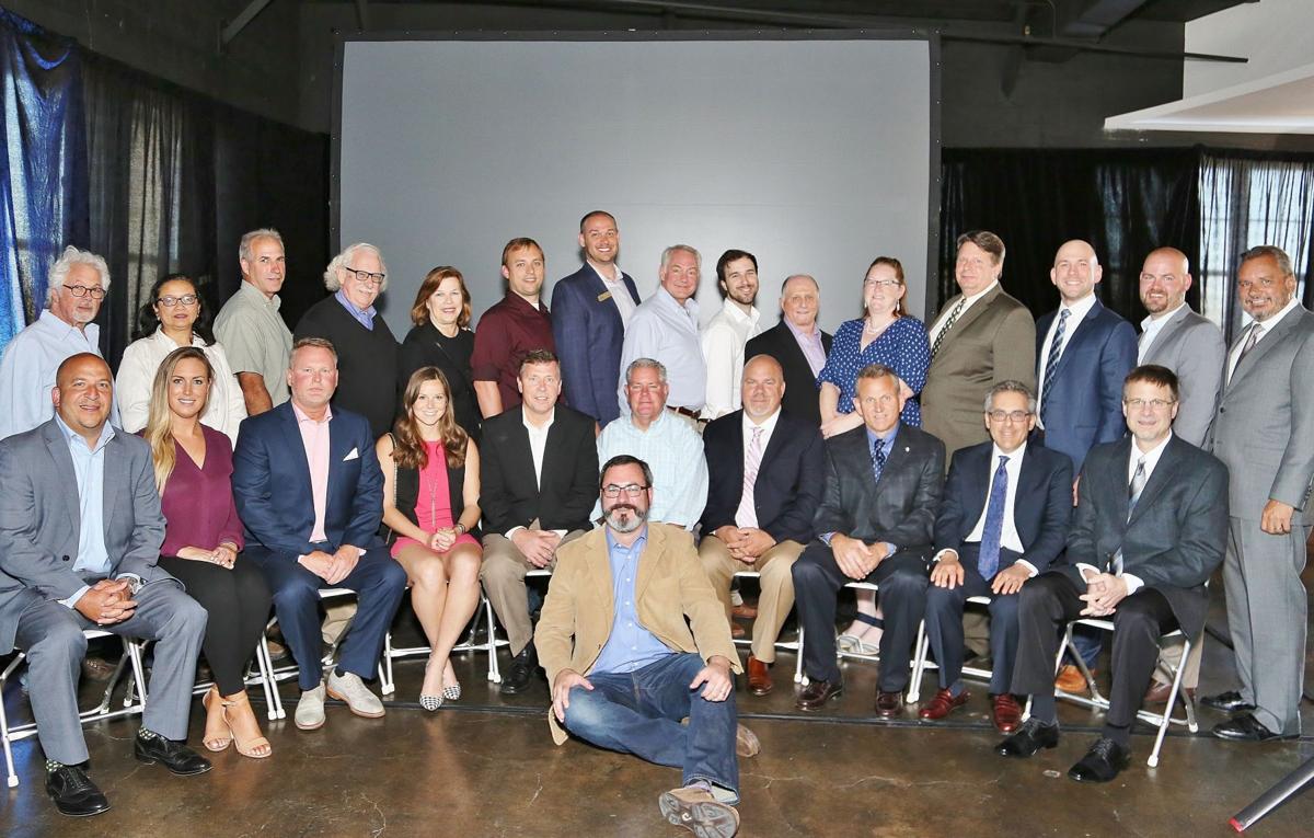 Front: Matt Lanzone, Lauren Ruzicka, Jim Treis, Alyssa Houska, Chris West, Shawn Luesse, Frank Jacobs, David Roth, Jim Singer, John Kahrhoff
Back: Tom Cohen, San San Smith, Lee Lindsey, Timothy and Marcia Dorsey, Nathan Zierer, Chris Caskey, Doug Herty,
