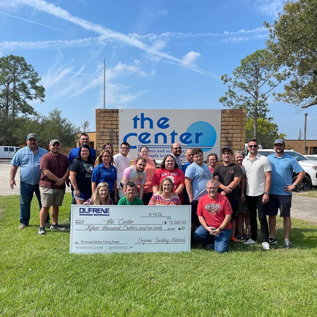 Dufrene Building Materials donates 15,000 check to The Center Local