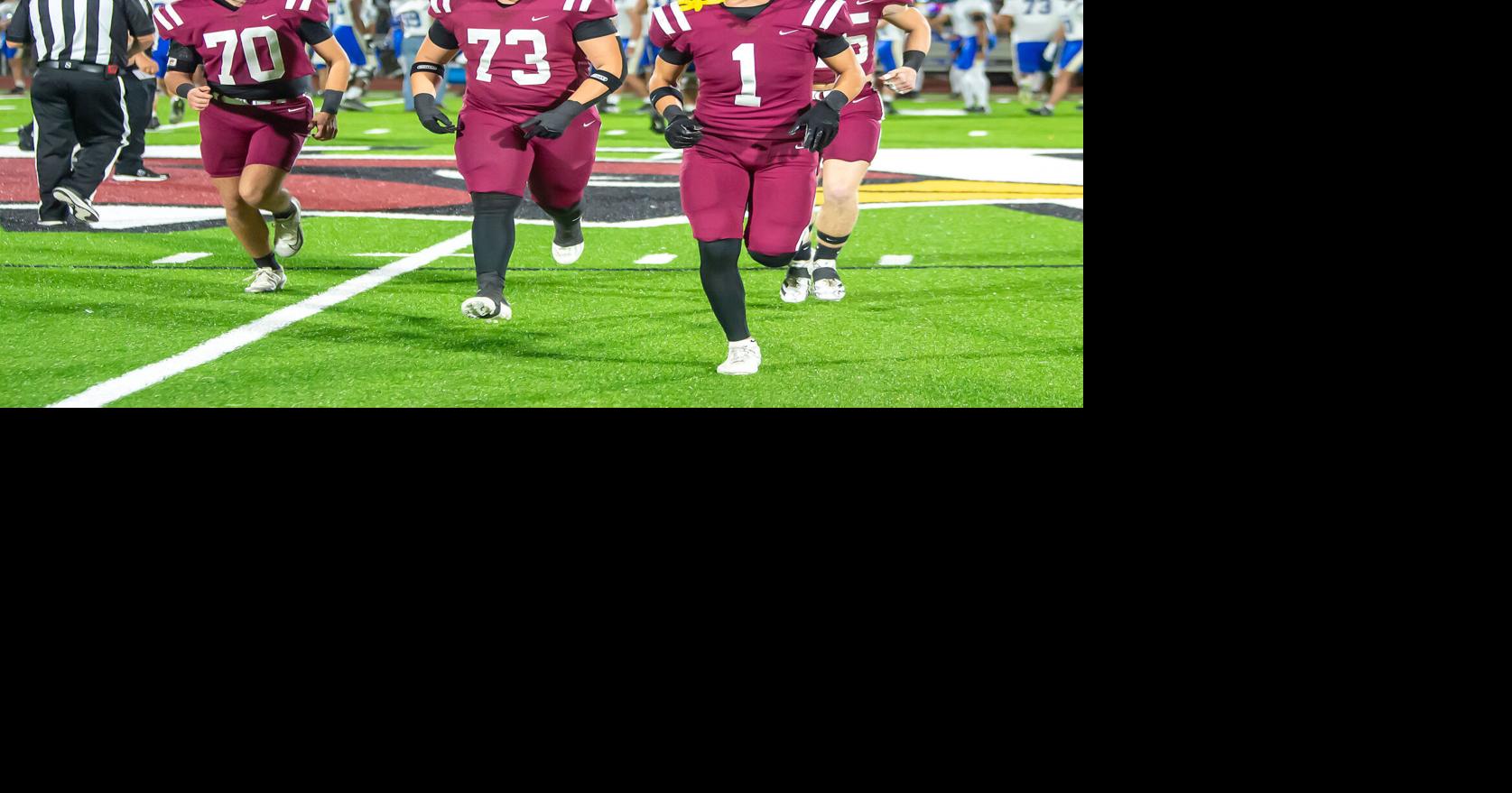 Cardinals clinch district title with rivalry win, will receive bye week in round one of playoffs