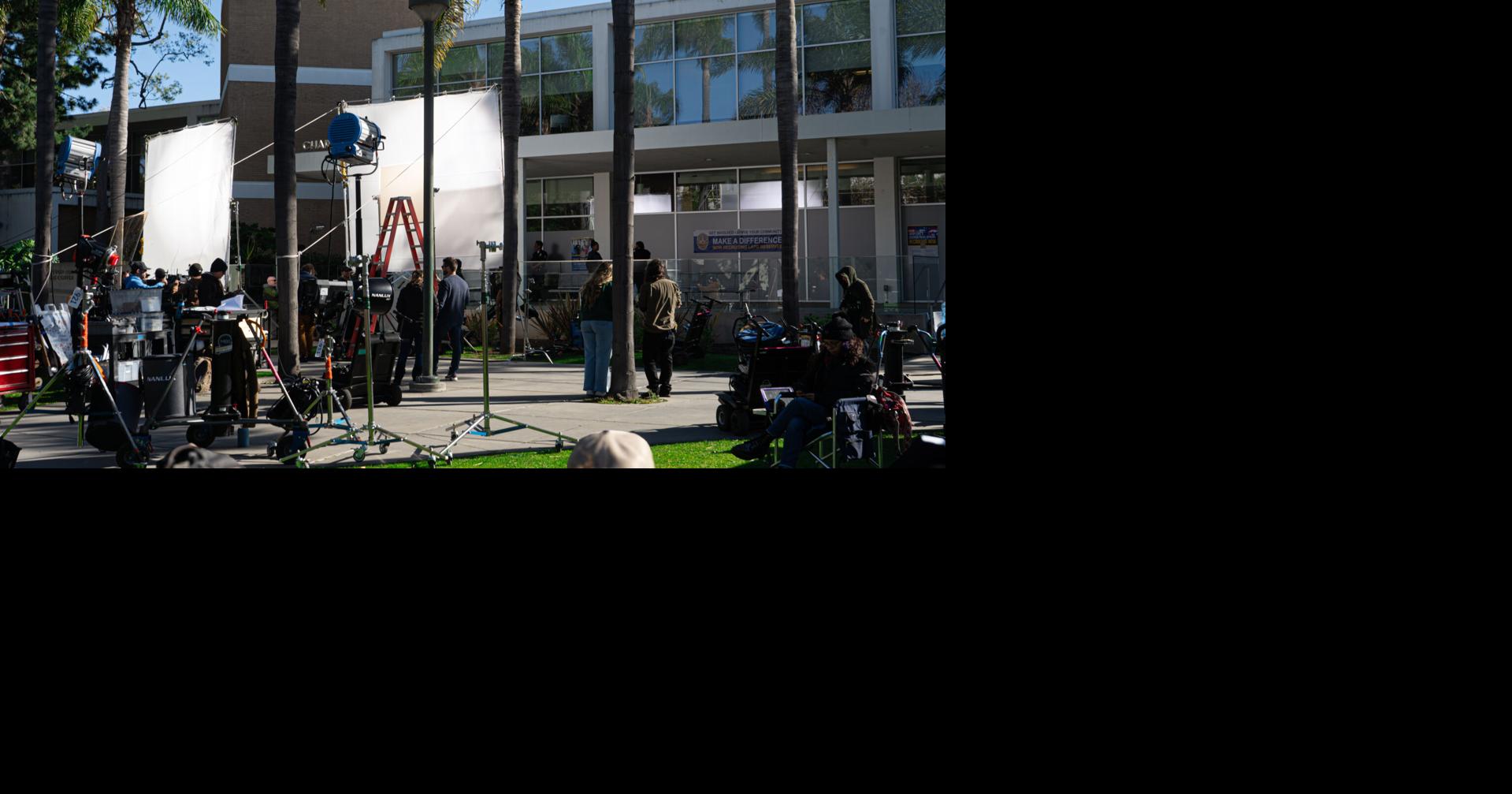 Filming of ‘police procedural drama series’ draws crowd at Charles Von der Ahe Building