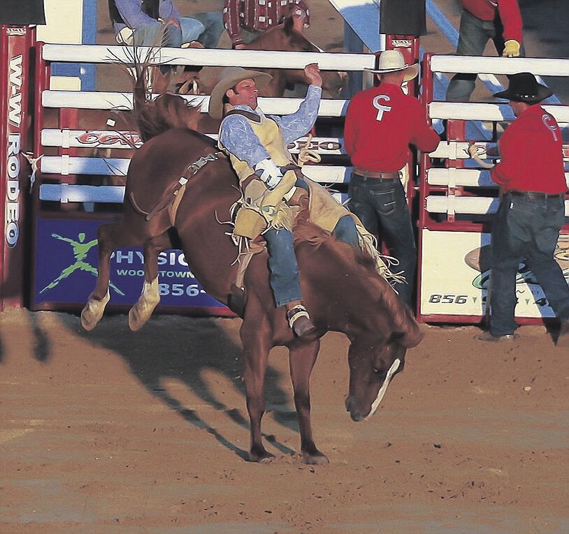 Delaware woman makes bull-riding history at Cowtown Rodeo