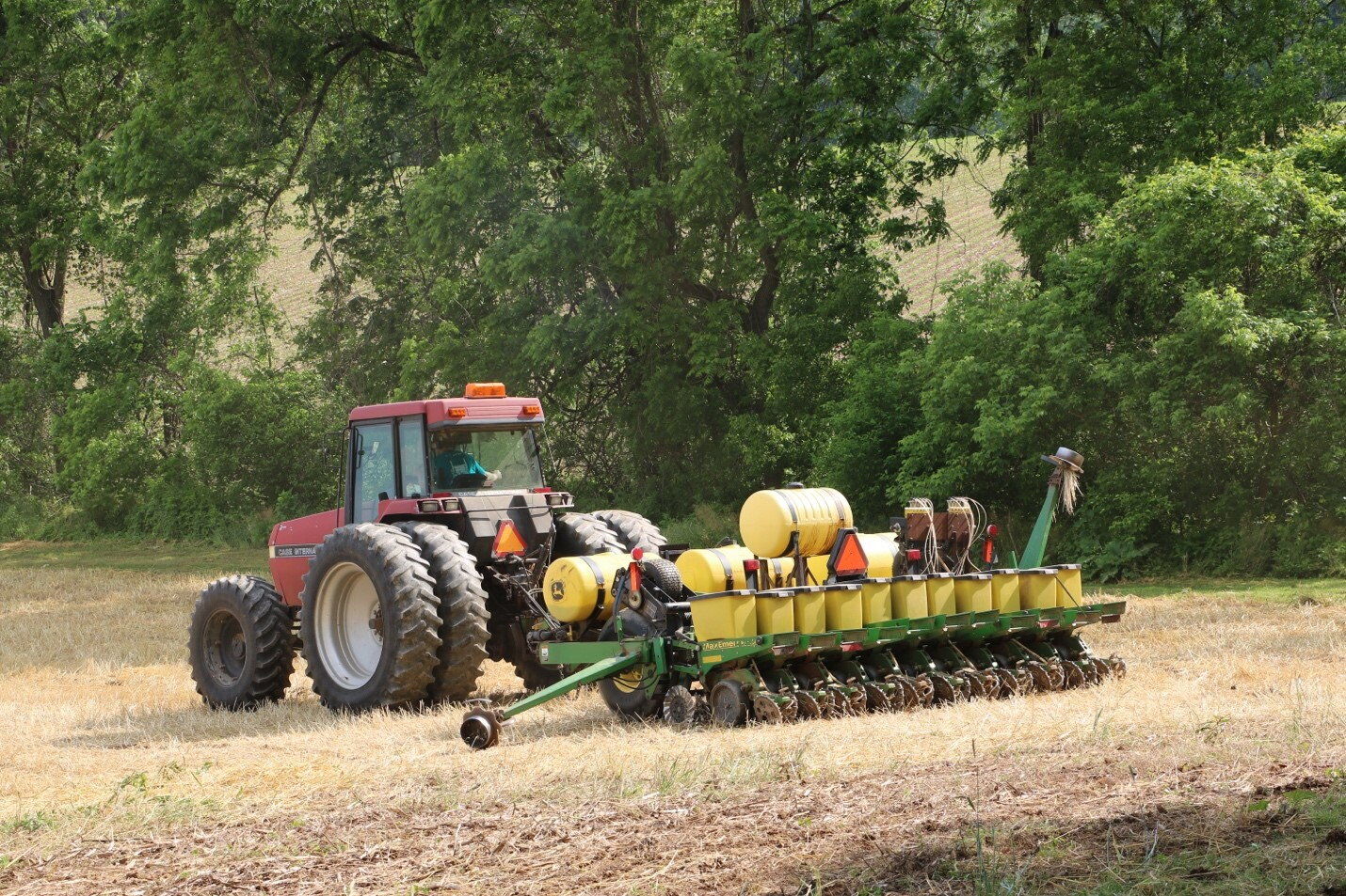 a tractor planting in a field