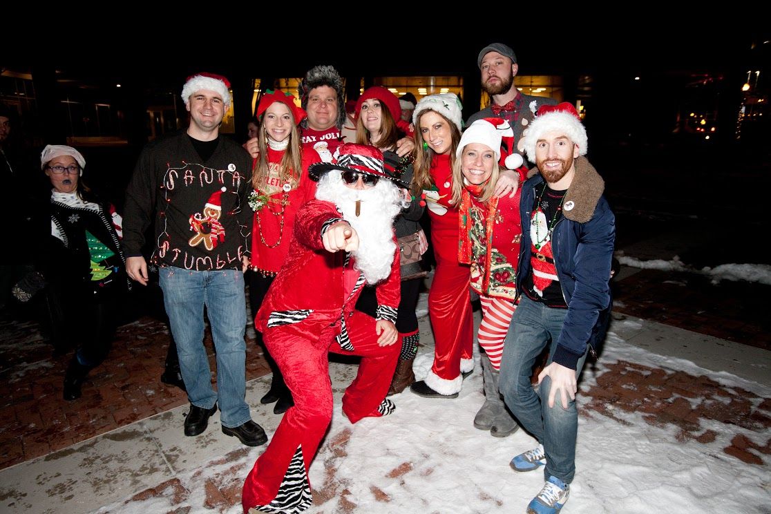 Stumbling for a cause Santathemed pub crawl supports city’s mounted