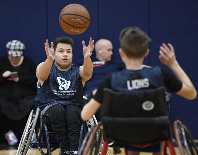 Local athletes come together to form wheelchair basketball team [photos] Local News