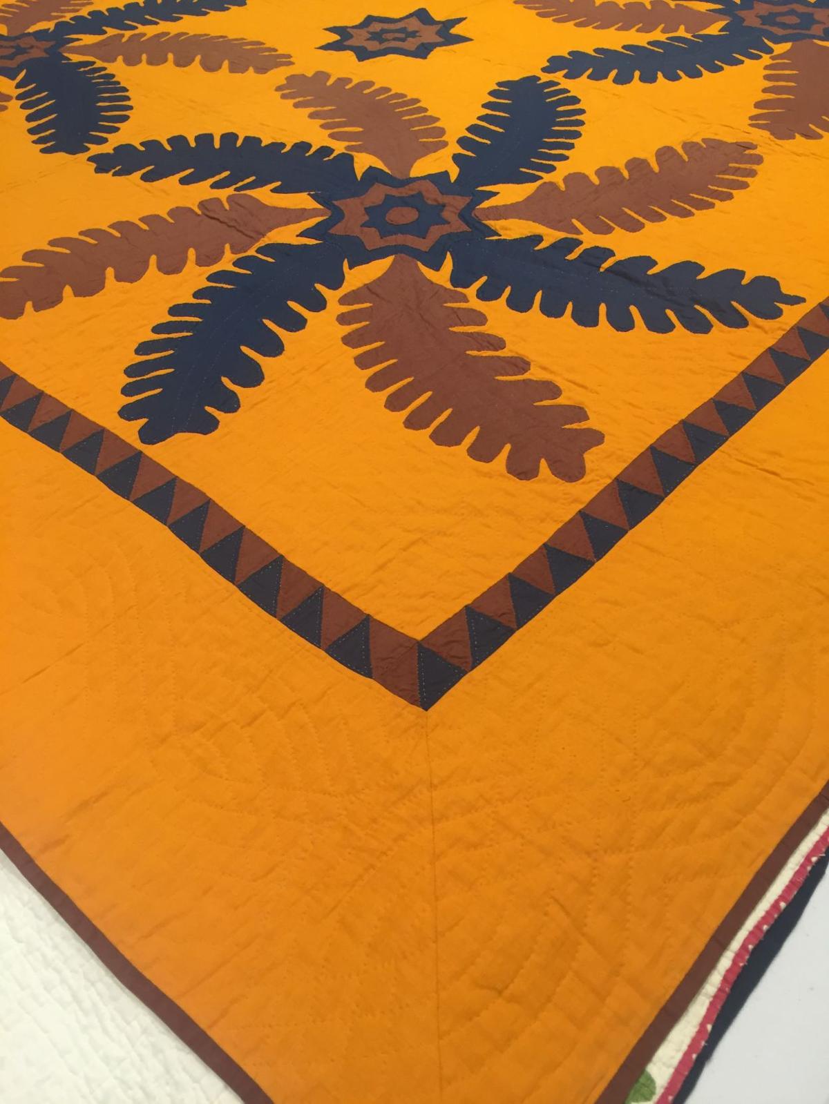 This vintage quilt is so orange, it's called a cheddar quilt Together