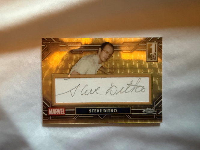 Lancaster city man pulls card signed by Spider-Man co-creator