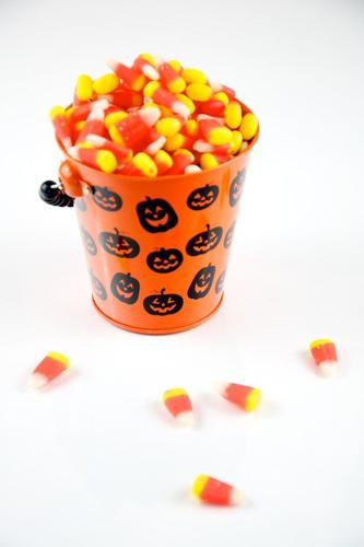 Candy Corn in Halloween Pail