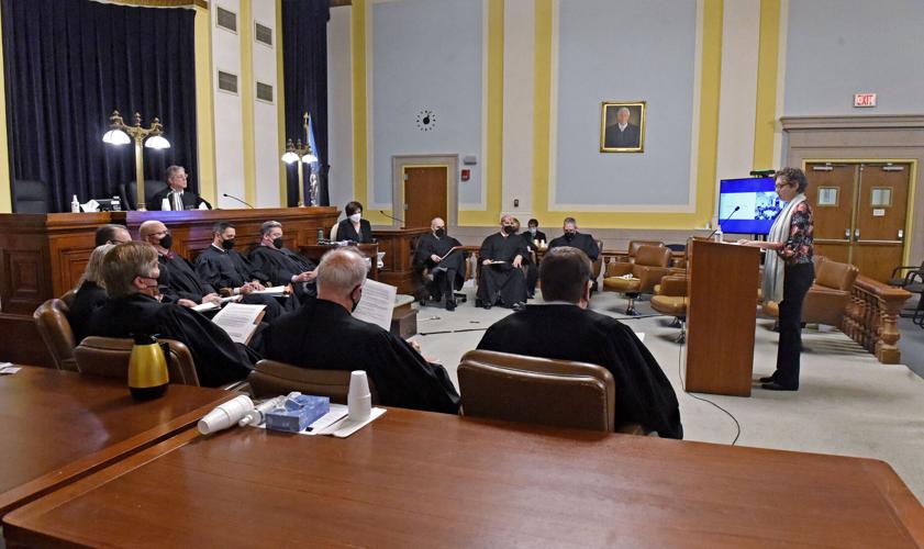 Panel of judges interview candidates for county commissioner [photos