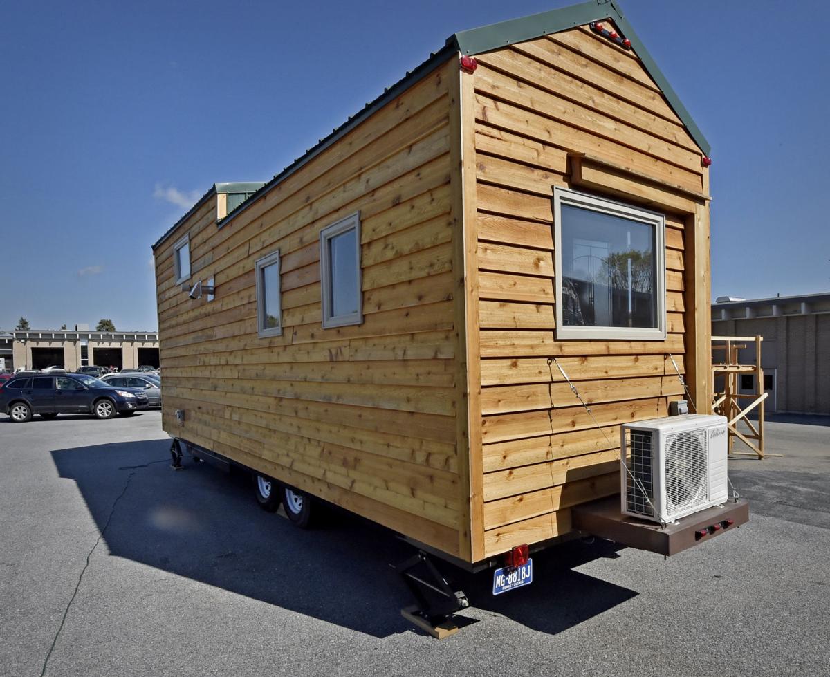 More than 200 high school students build tiny house to be sold for more