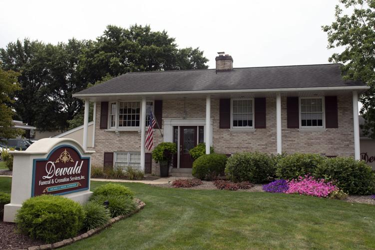 Funeral home directors care for the living by working with the dead