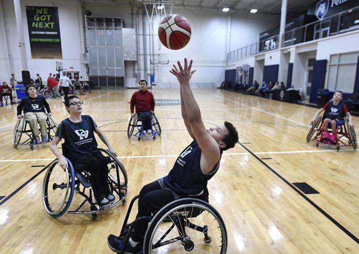 Local athletes come together to form wheelchair basketball team [photos] Local News