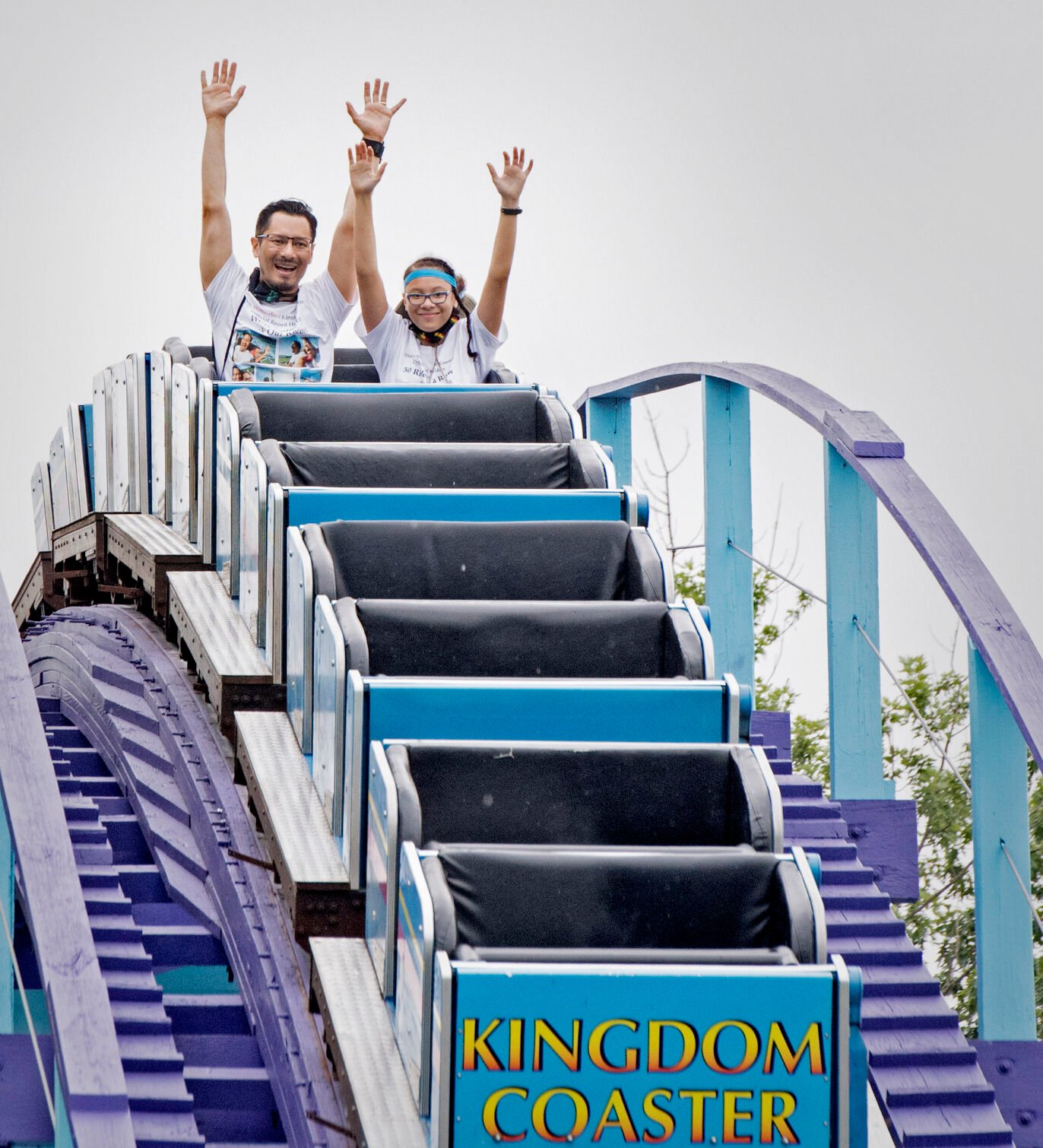 Father and daughter ride Dutch Wonderland s Kingdom Coaster 75