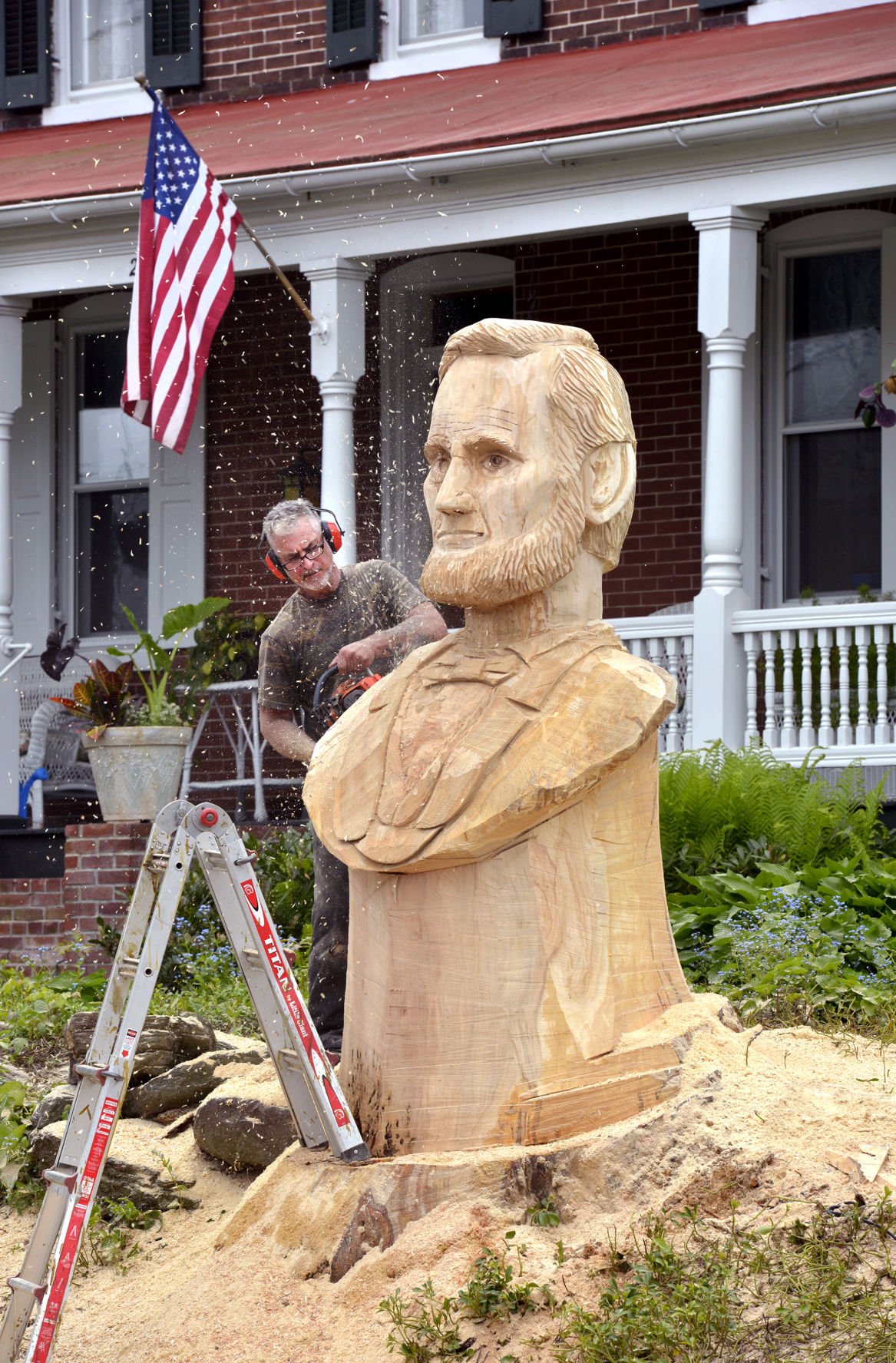New Abe Lincoln Statue Ears On Marietta Ave Local News Lincoln Carving03 Jpg