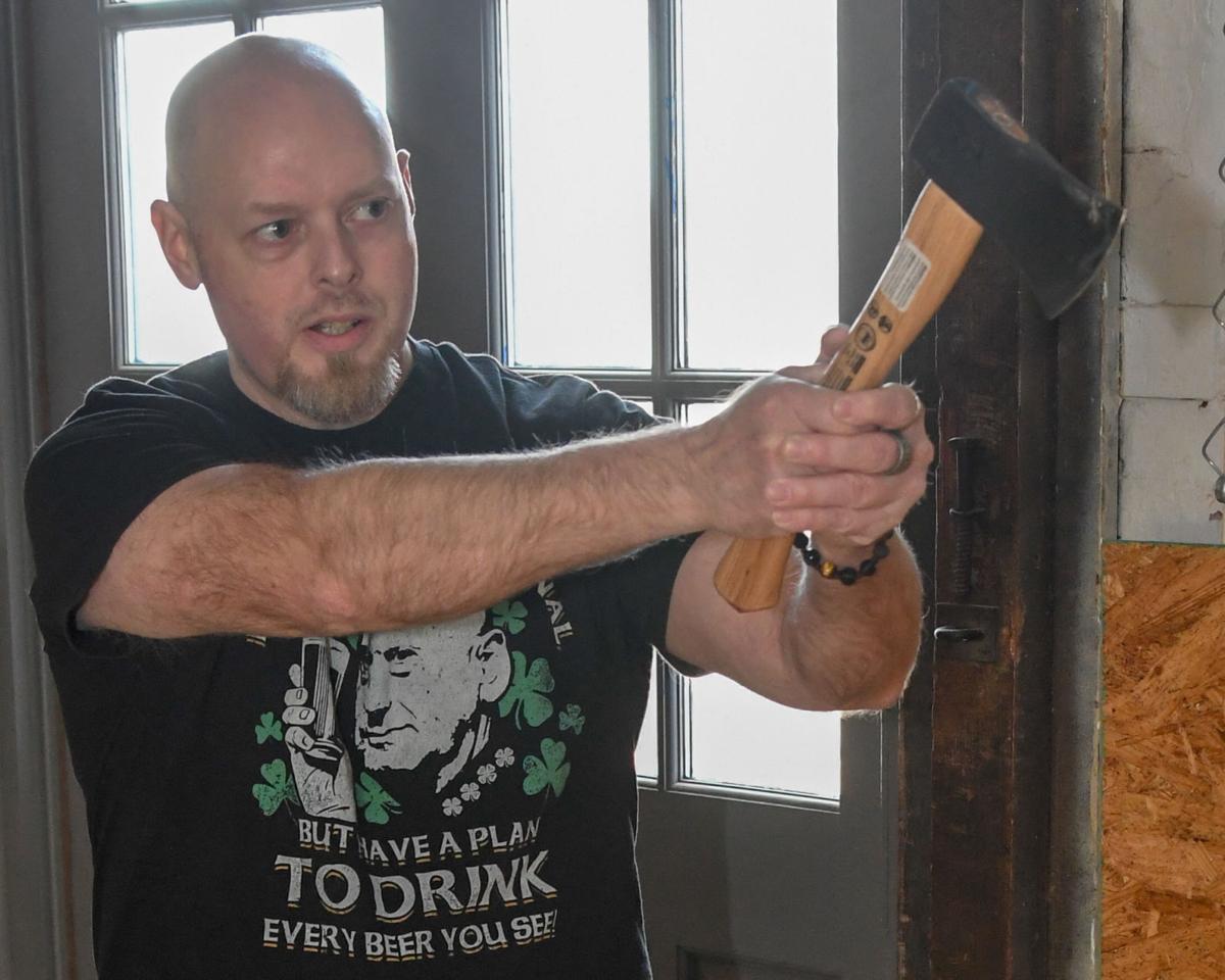 Lancaster County's first indoor axthrowing range opens in a mead bar