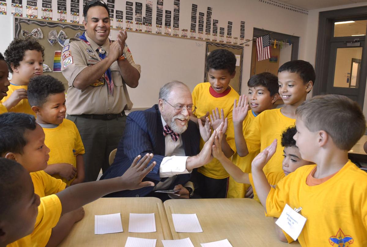  Lancaster Mayor Rick Gray gives high fives while playing a matching game with local Cub Scouts at Wharton Elementary School on Tuesday July 23, 2017. This is part of the ScoutReach presentation.<br />
RICHARD HERTZLER | Staff Photographer