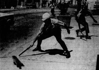 Police chasing groundhog in Penn Square, 1972