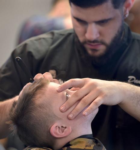 How a Lancaster city barber cut a 76er's hair and weathered the