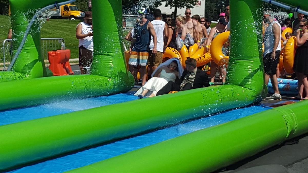 Slide The City Bride And Groom Join Thousands At Giant Slip And