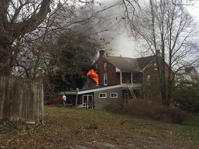 Firefighters battle 2-alarm house fire in Marietta | Local News ...