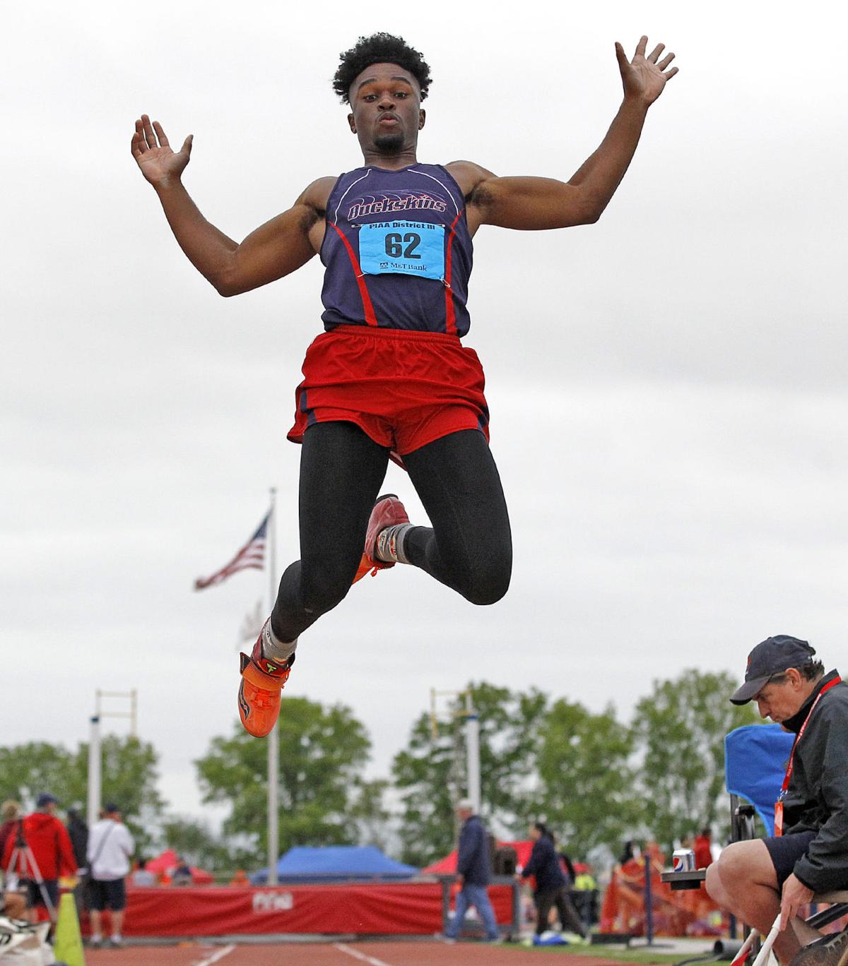 District 3 Track and Field LL League boys crowd the medal stand in 3A