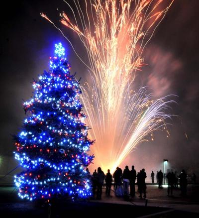 Fireworks light sky at tree-lighting ceremony in Paradise Township